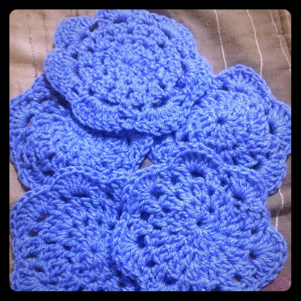 Set of 5 hand crocheted table coasters.